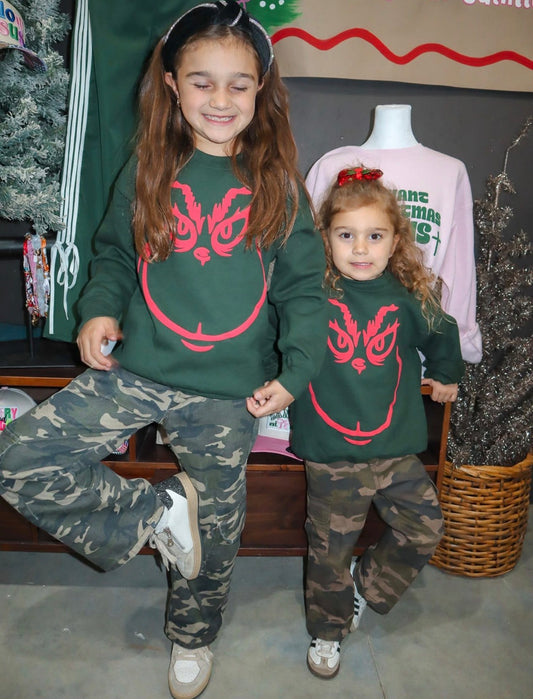 Red Grinch on Green Youth