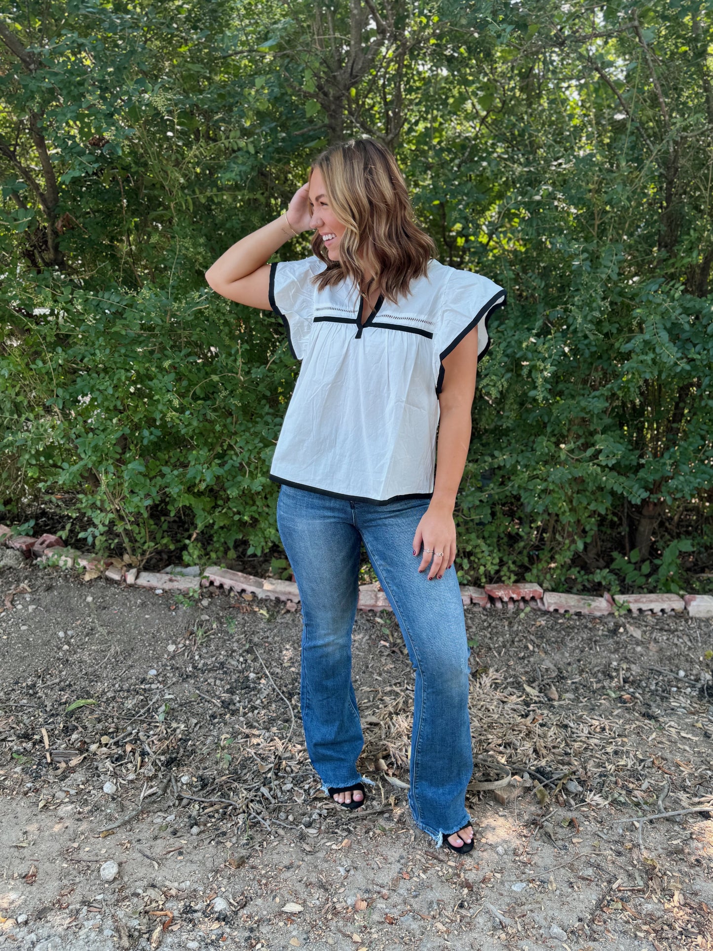 Off white/black ruffle sleeve blouse