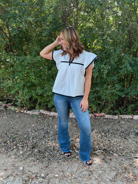 Off white/black ruffle sleeve blouse